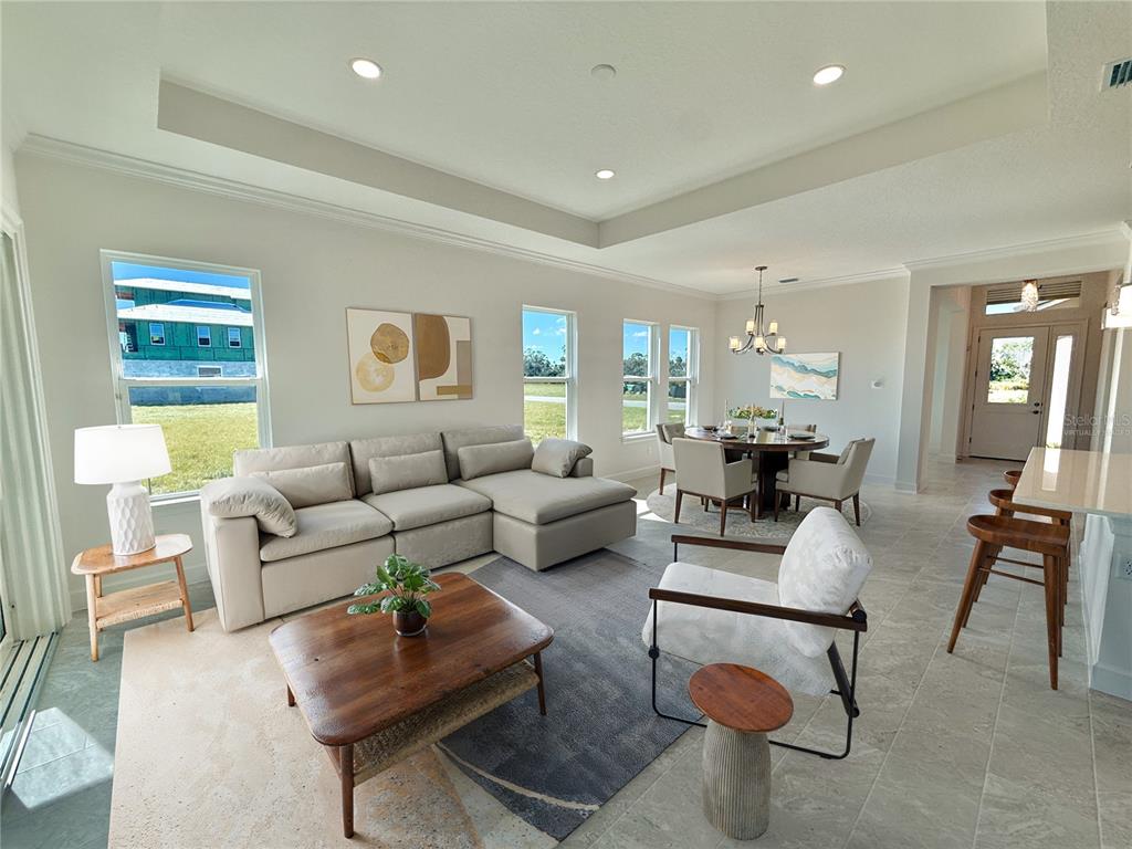 4 Coronado Road Flagler Beach, FL 32136 - Photo 11 of 63 a living room with furniture and a table