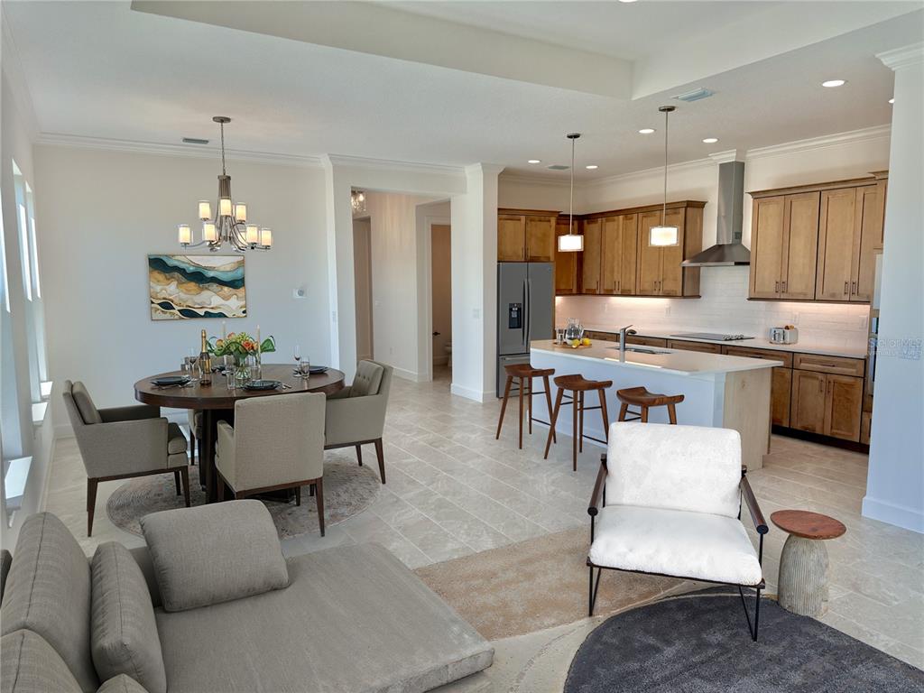 4 Coronado Road Flagler Beach, FL 32136 - Photo 17 of 63 a view of a dining room with furniture and chandelier
