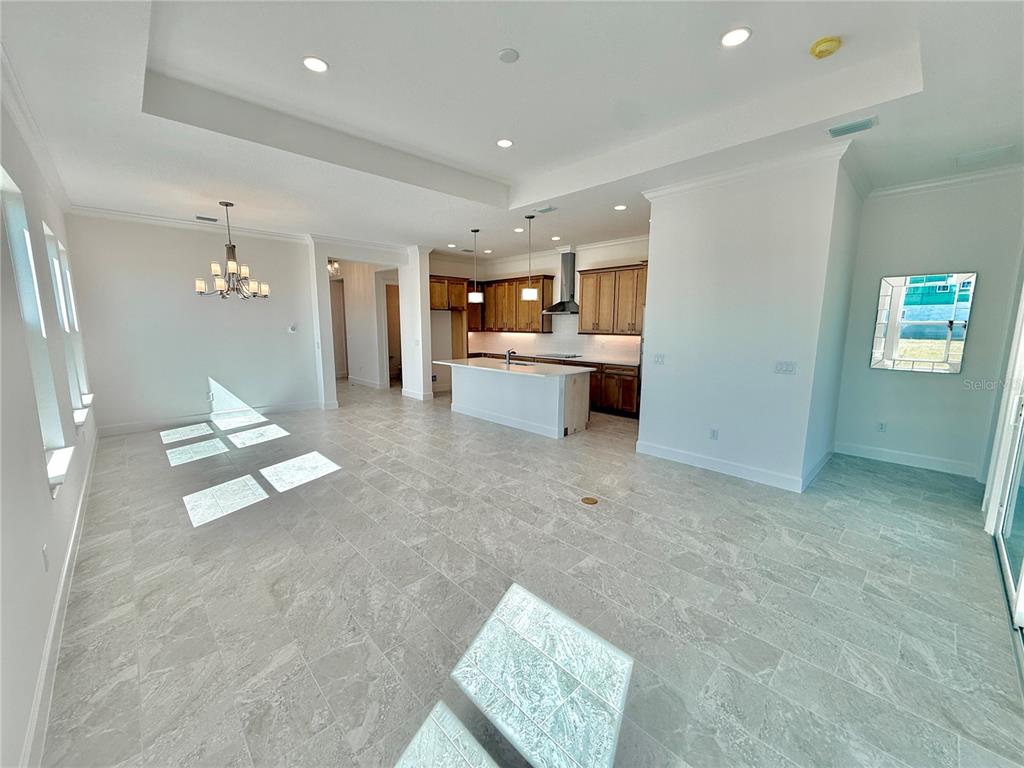 4 Coronado Road Flagler Beach, FL 32136 - Photo 28 of 63 a living room with furniture and a dining table