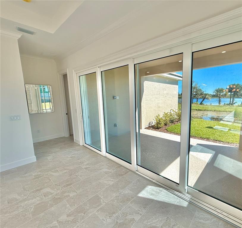 4 Coronado Road Flagler Beach, FL 32136 - Photo 30 of 63 a view of an empty room and window