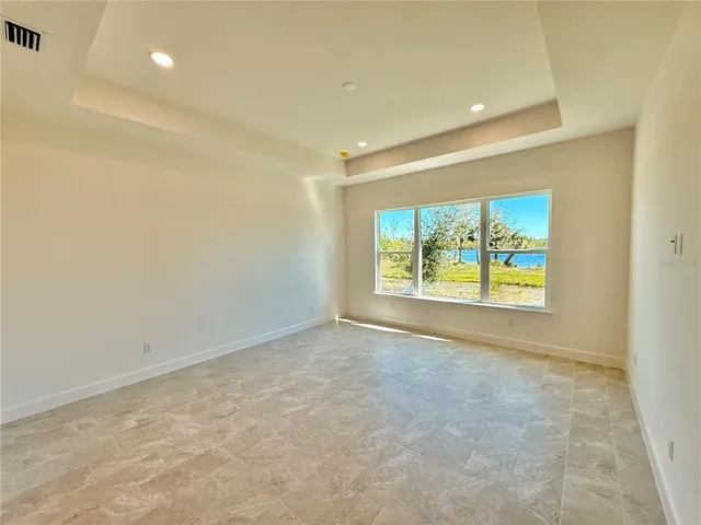 a bathroom with double vanity sink and a mirror