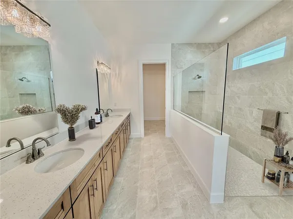 a bath room with a toilet and a bath tub