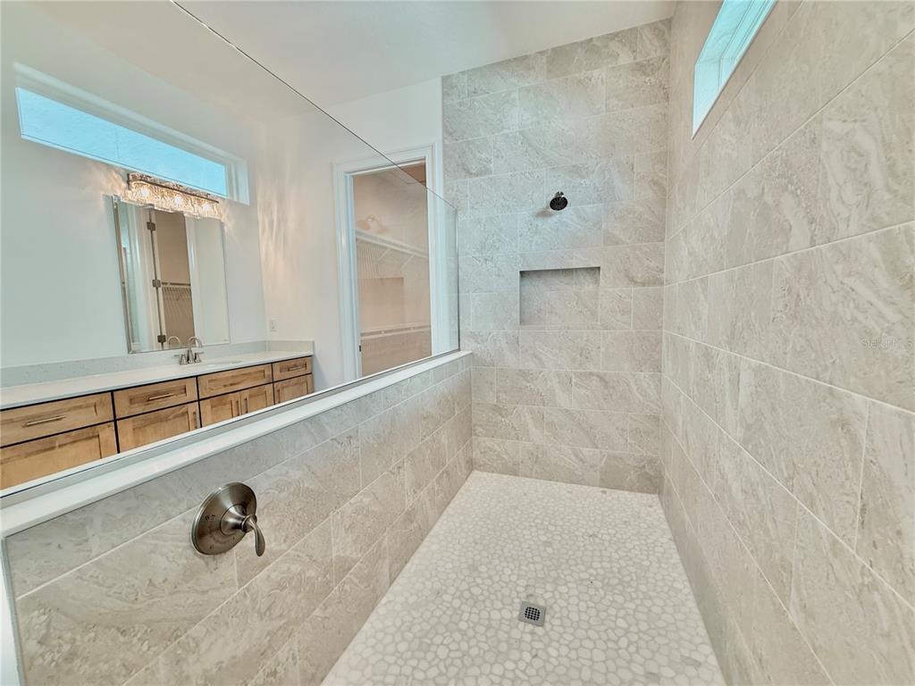 4 Coronado Road Flagler Beach, FL 32136 - Photo 47 of 63 a bathroom with a shower