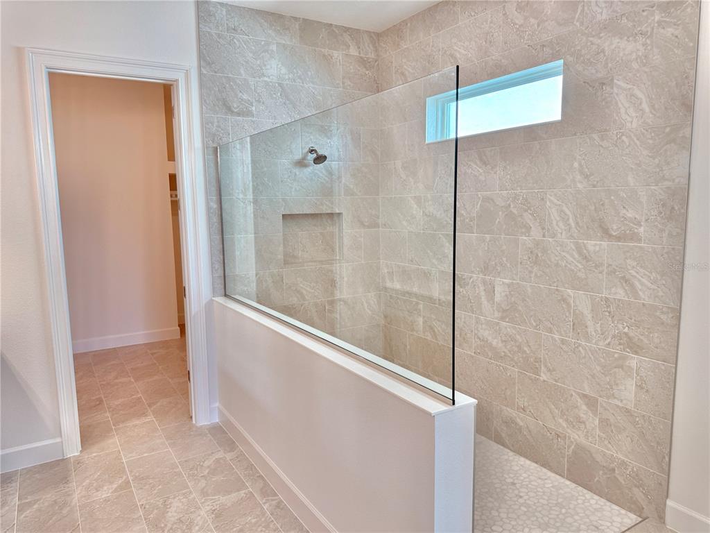 4 Coronado Road Flagler Beach, FL 32136 - Photo 48 of 63 a bathroom with a shower