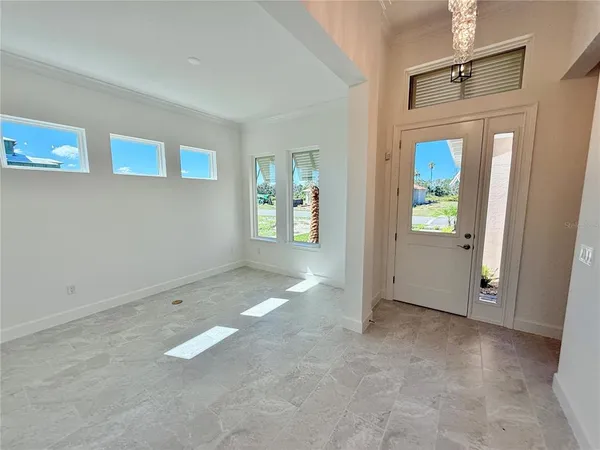 a view of livingroom with furniture and windows
