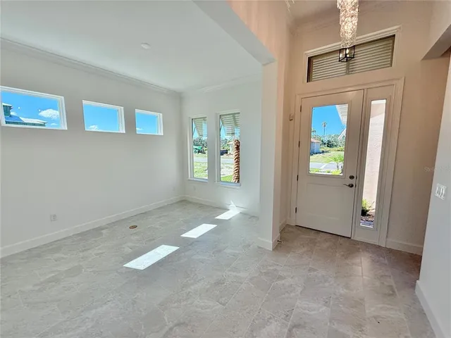 a view of livingroom with furniture and windows