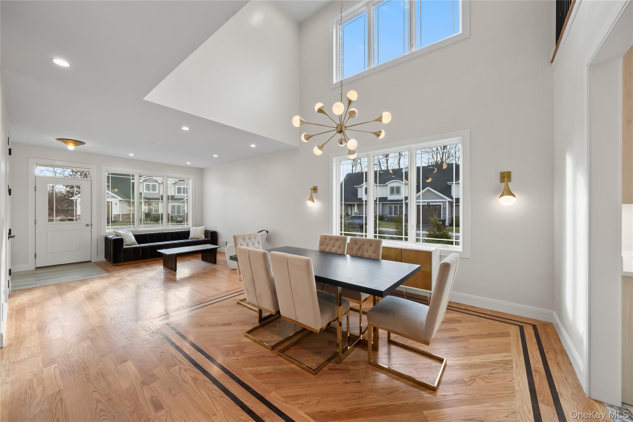 63 Dessau Circle, Unit 52 Spring Valley, NY 10977 - Photo 15 of 48 a view of a dining room with furniture and wooden floor