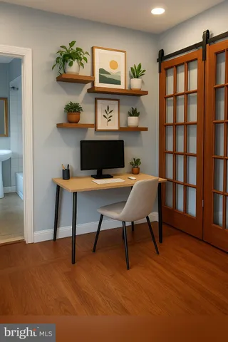 a workspace with furniture and window