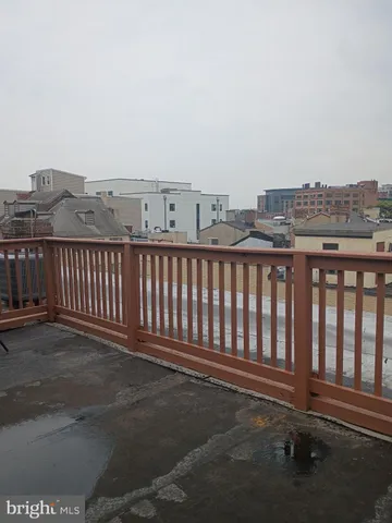 a view of a balcony with an ocean
