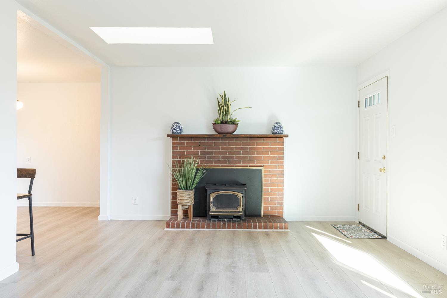 1225 Matanzas Way Santa Rosa, CA 95405 - Photo 12 of 44 a living room with a fireplace