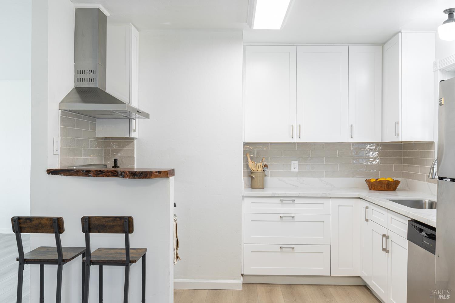 1225 Matanzas Way Santa Rosa, CA 95405 - Photo 16 of 44 a kitchen with a cabinets and chair