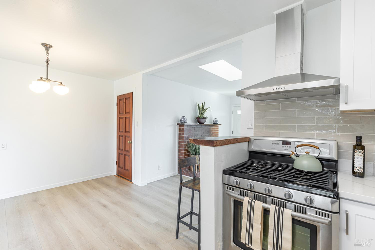 1225 Matanzas Way Santa Rosa, CA 95405 - Photo 18 of 44 a kitchen with a stove and cabinets