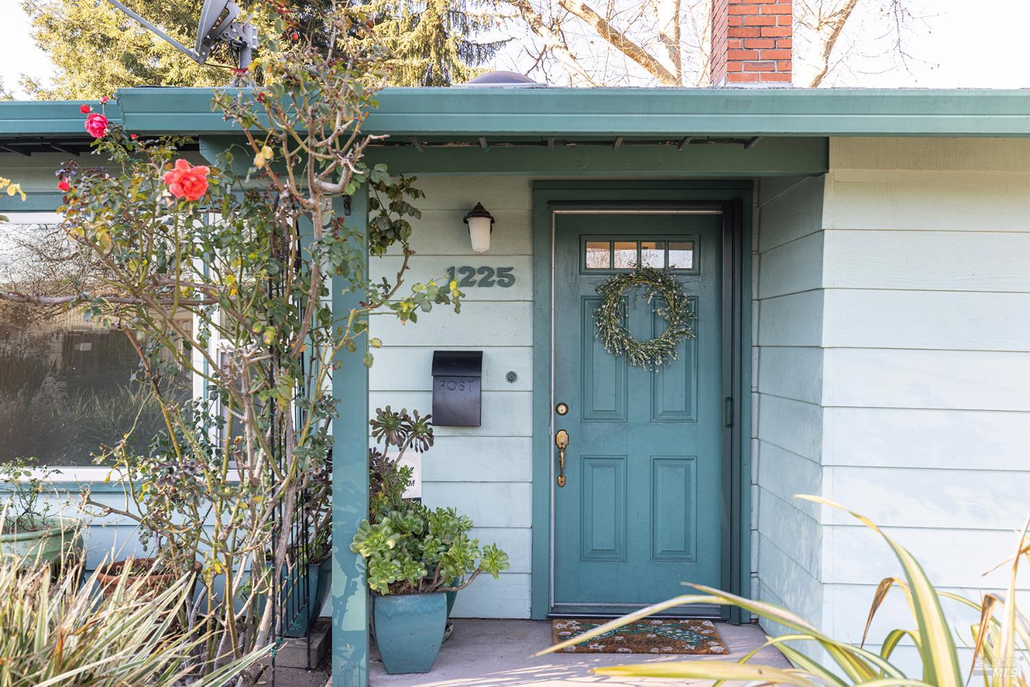 1225 Matanzas Way Santa Rosa, CA 95405 - Photo 7 of 44 a view of entryway with a flower garden