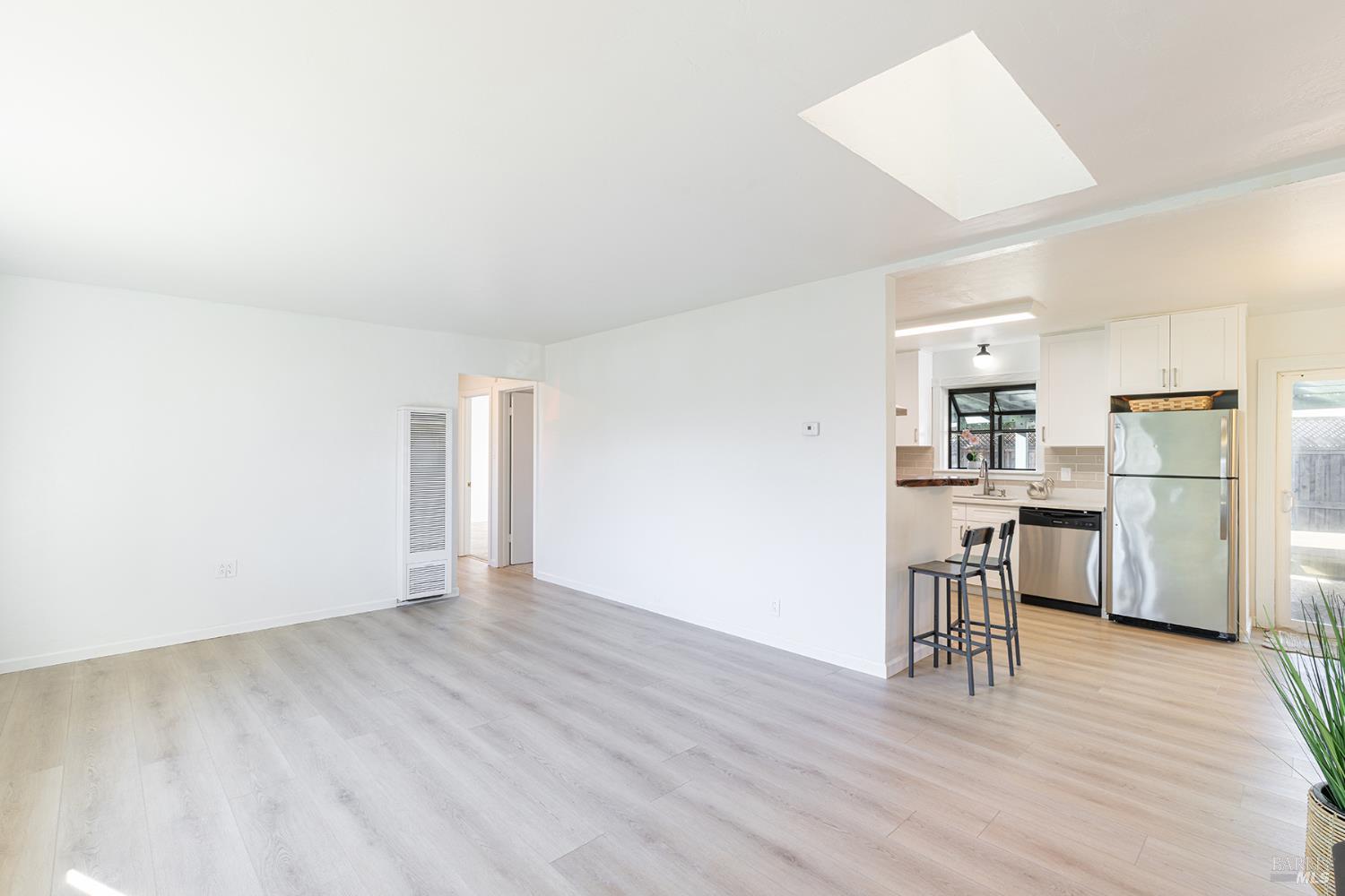1225 Matanzas Way Santa Rosa, CA 95405 - Photo 10 of 44 a view of kitchen with wooden floor and electronic appliances