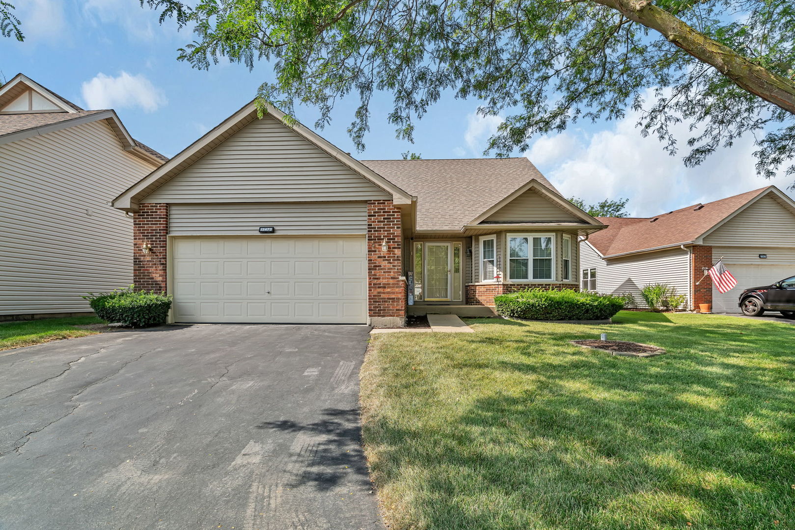 13472 Redberry Circle Plainfield, IL 60544 - Photo 1 of 30 a front view of a house with a yard and garage