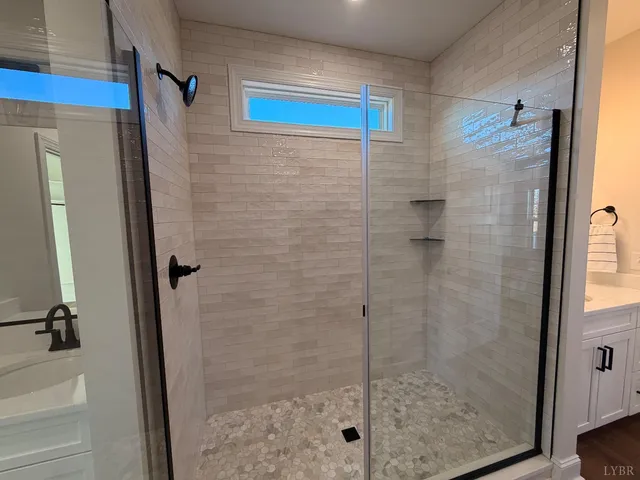 a view of a room with wooden walls