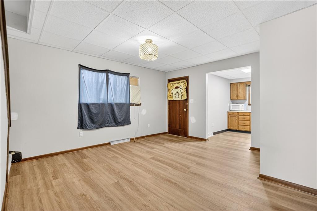 108 9th Street Monongahela, PA 15063 - Photo 12 of 31 an empty room with wooden floor and windows