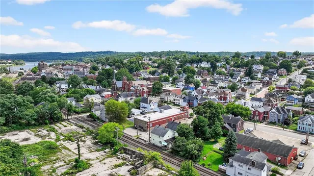 an aerial view of a city with lots of residential buildings
