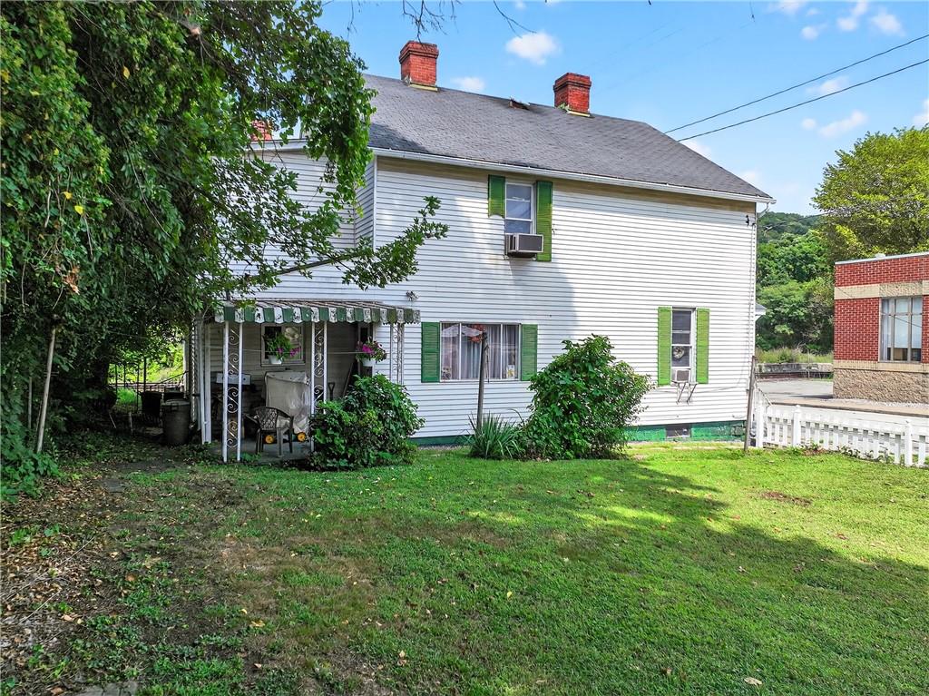 108 9th Street Monongahela, PA 15063 - Photo 6 of 31 a front view of a house with a yard and trees
