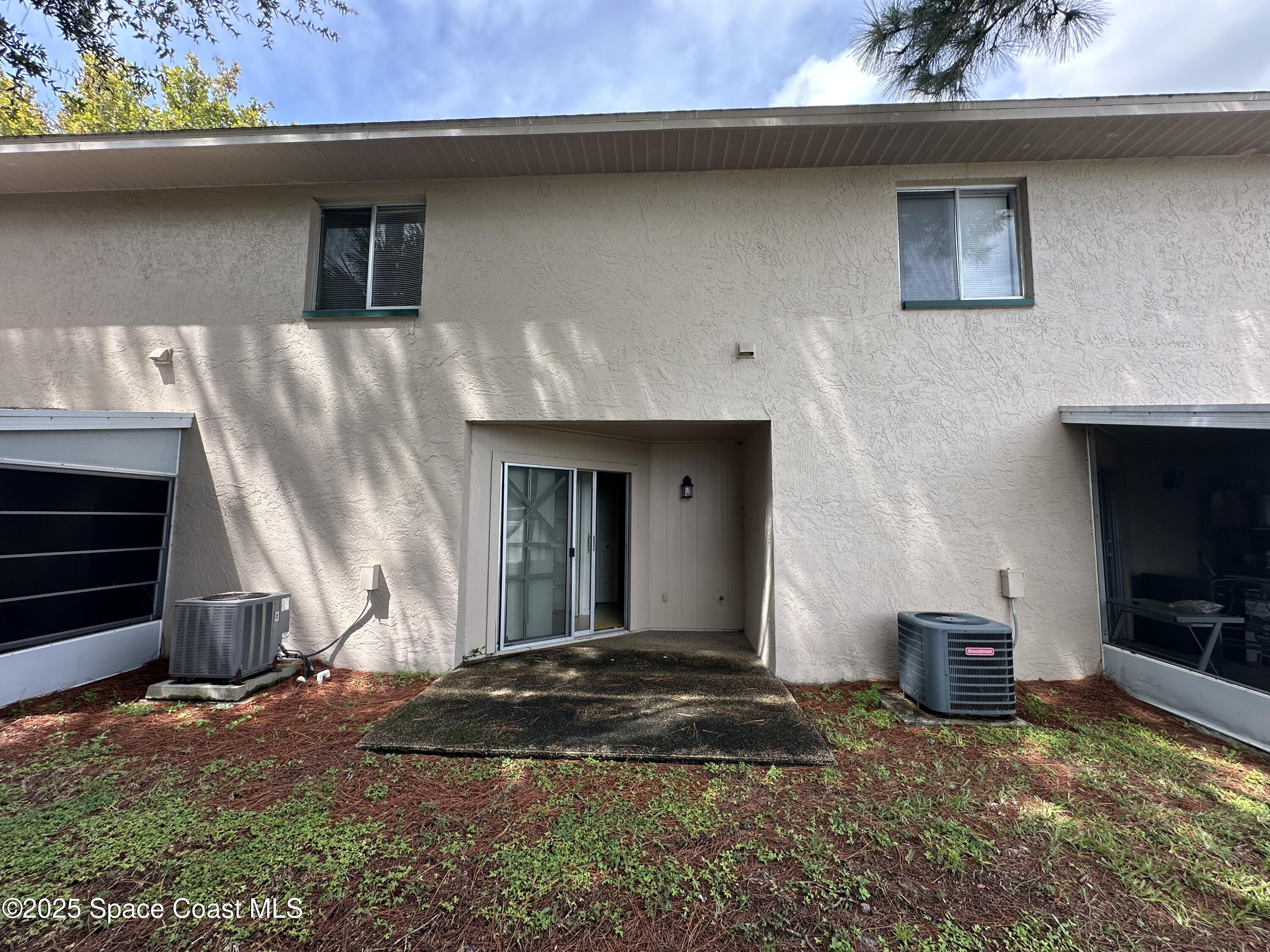 1882 Murrell Road, Unit J36 Rockledge, FL 32955 - Photo 2 of 12 a view of outdoor space and yard