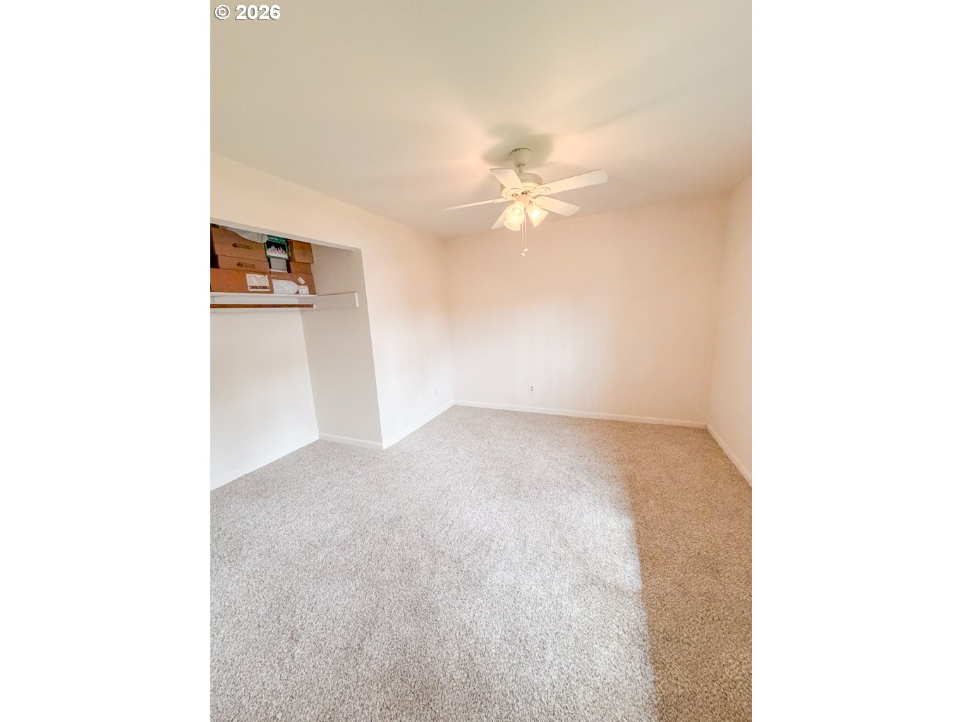610 Tiara Street Lakeside, OR 97449 - Photo 16 of 28 a view of a big room with closet and ceiling fan