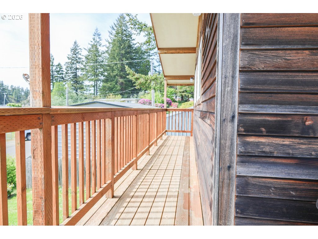 610 Tiara Street Lakeside, OR 97449 - Photo 19 of 28 a view of balcony with wooden floor
