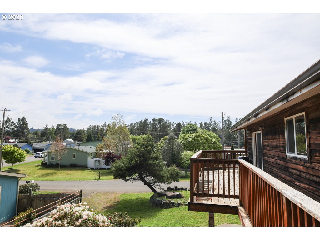 610 Tiara Street Lakeside, OR 97449 - Photo 21 of 28 a view of a swimming pool with a patio