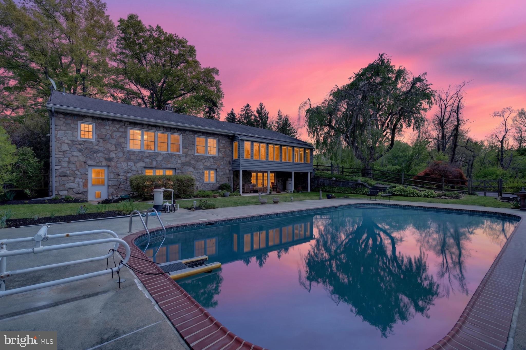 300 Sanatoga Road Pottstown, PA 19465 - Photo 3 of 79 Serene sunset by the poolside retreat.