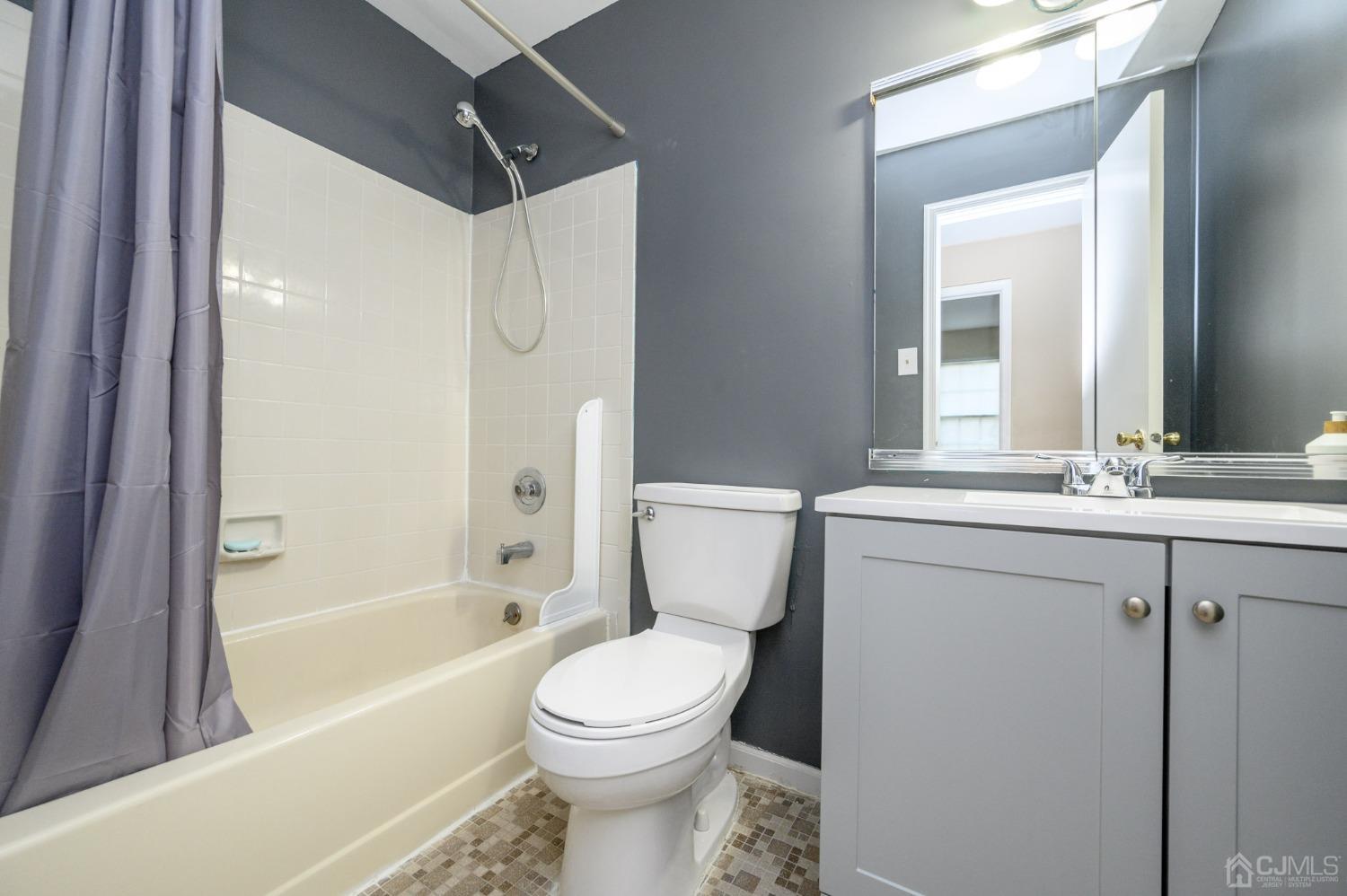 7 Blueberry Path Howell, NJ 07731 - Photo 23 of 39 a bathroom with a sink toilet and shower