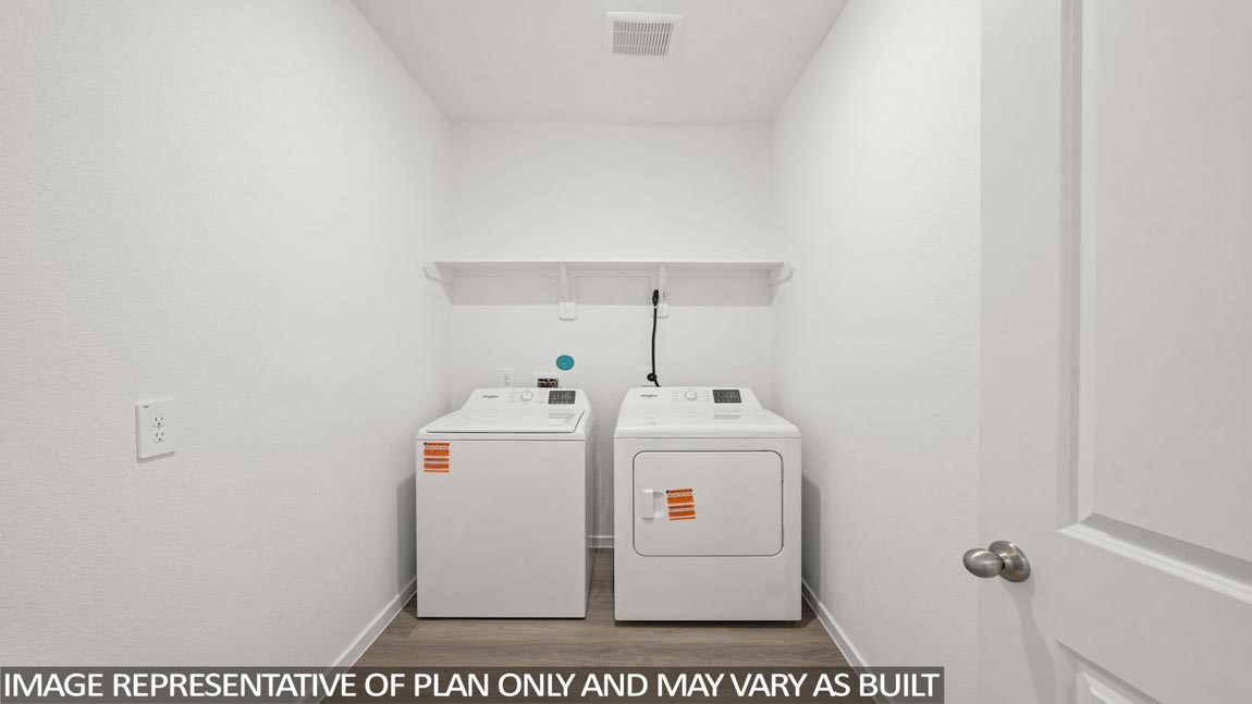 565 Wax Myrtle Way Hockley, TX 77447 - Photo 12 of 14 a utility room with dryer and washer