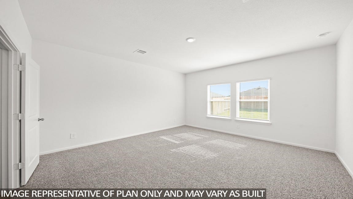 565 Wax Myrtle Way Hockley, TX 77447 - Photo 5 of 14 a view of an empty room with a window