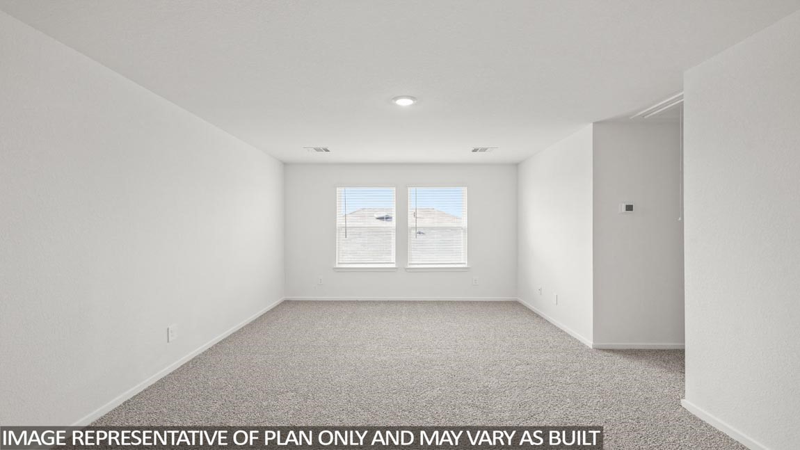 565 Wax Myrtle Way Hockley, TX 77447 - Photo 8 of 14 a view of an empty room with a window