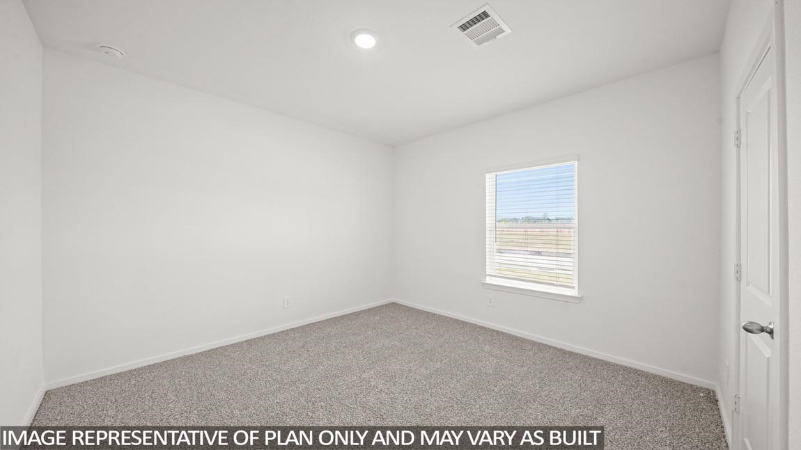 565 Wax Myrtle Way Hockley, TX 77447 - Photo 9 of 14 a view of an empty room with a window