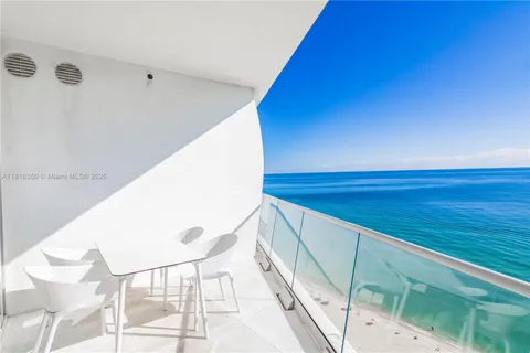 a view of balcony with furniture