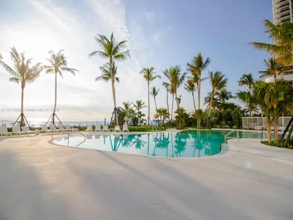 a view of a garden with palm trees