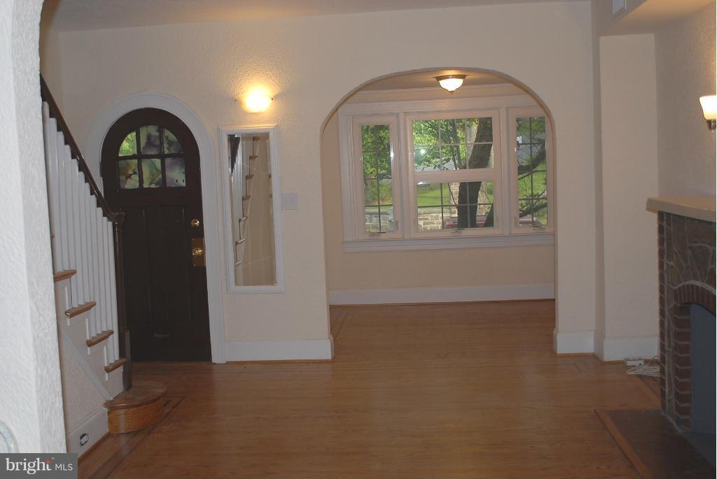 6212 Frederick Road Catonsville, MD 21228 - Photo 5 of 21 Living Room with view to Sitting Room