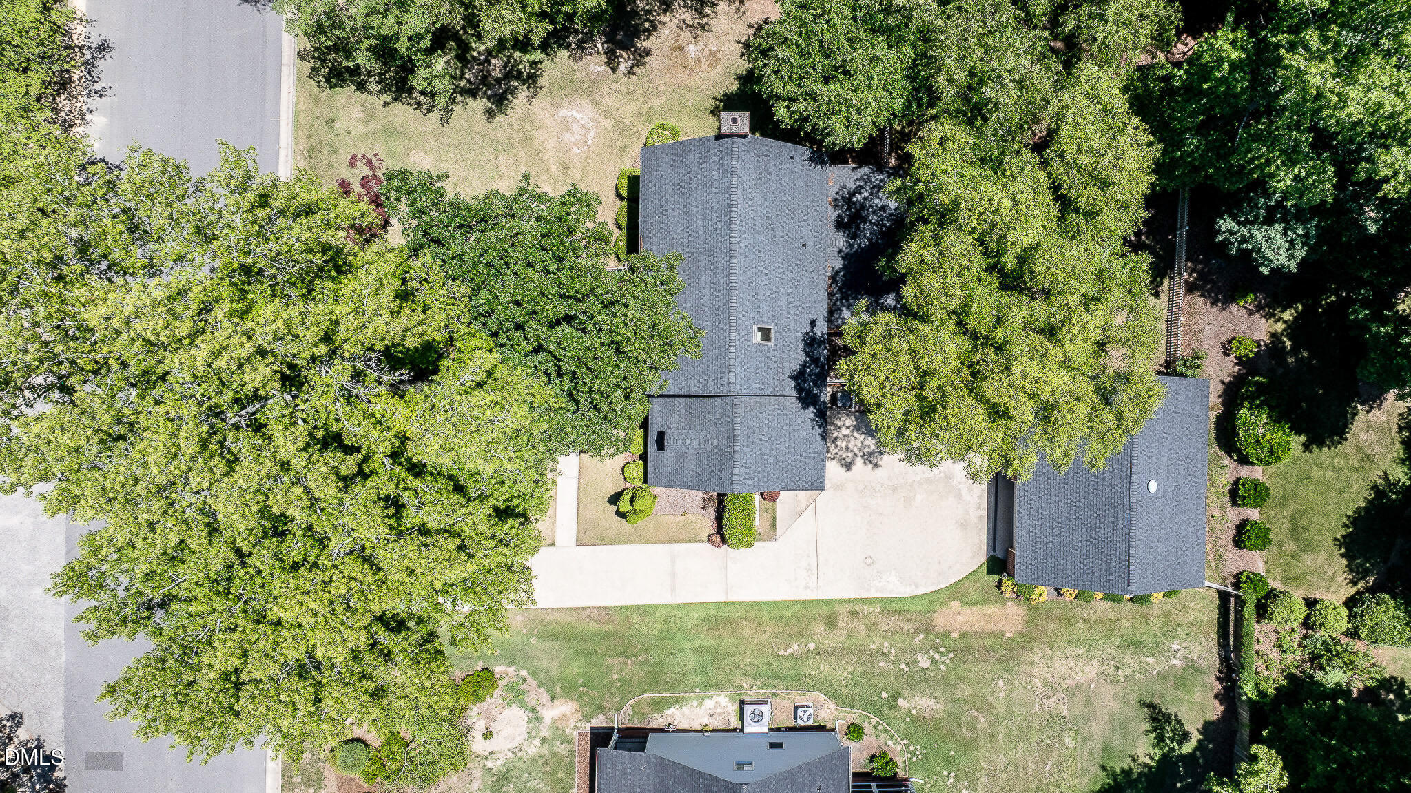 1215 Cambridge Road Northwest Wilson, NC 27896 - Photo 18 of 54 an aerial view of a house with a yard