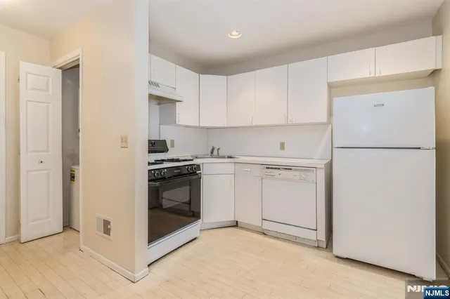 an empty room with a hallway