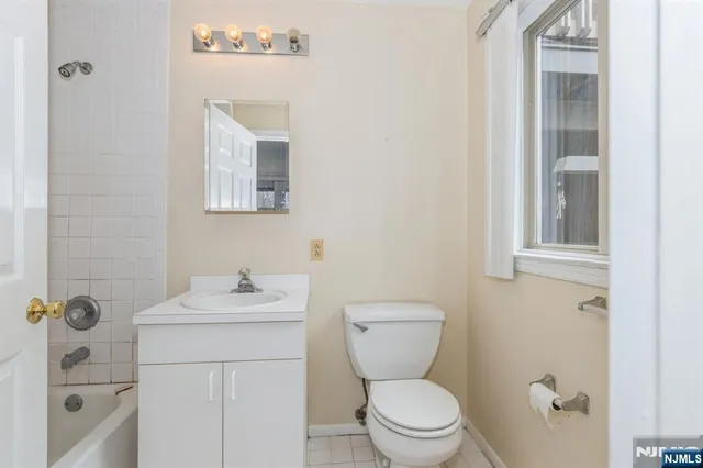 a bathroom with a sink and a bathtub