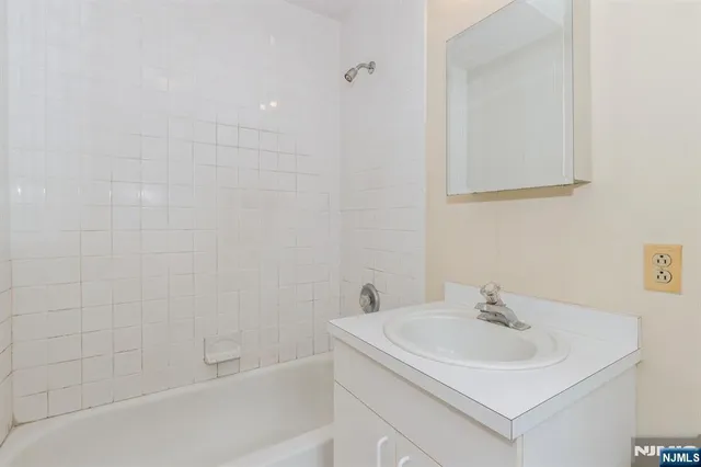 a view of backyard with plants and garden