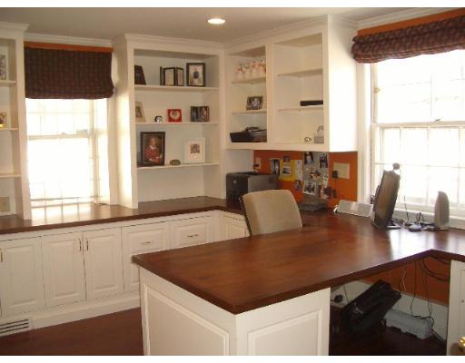 2 Rangeley Ridge Winchester, MA 01890 - Photo 13 of 18 a view of a kitchen with kitchen island a window a sink and a dining table