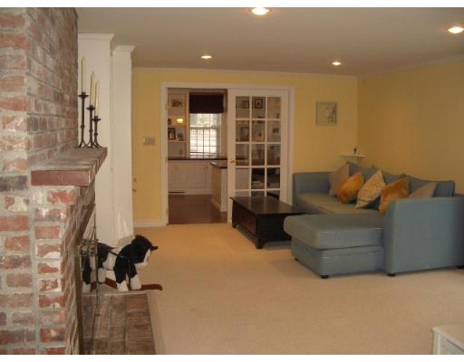2 Rangeley Ridge Winchester, MA 01890 - Photo 15 of 18 a bedroom with furniture and a fireplace