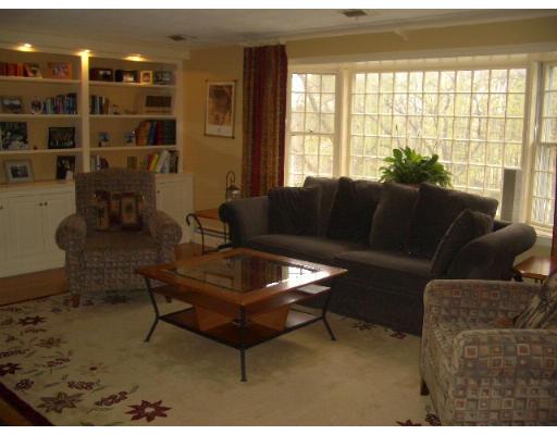 2 Rangeley Ridge Winchester, MA 01890 - Photo 2 of 18 a living room with furniture and a potted plant