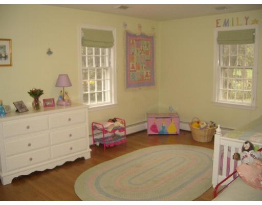 2 Rangeley Ridge Winchester, MA 01890 - Photo 9 of 18 a bedroom with a bed and a window