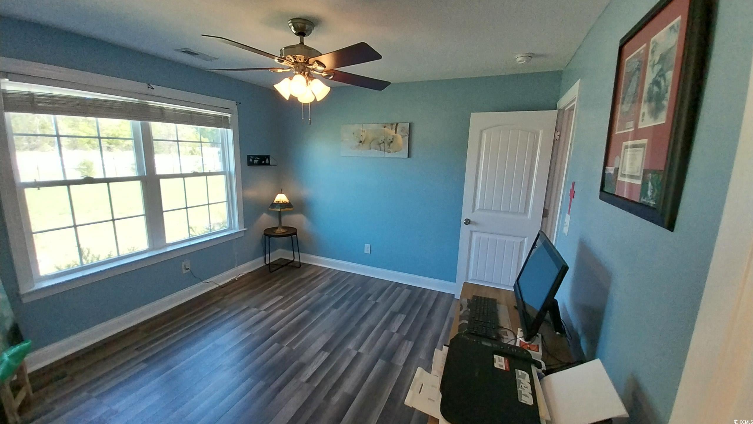 1210 Horry Road Aynor, SC 29511 - Photo 13 of 34 Unfurnished room with a ceiling fan, baseboards, d
