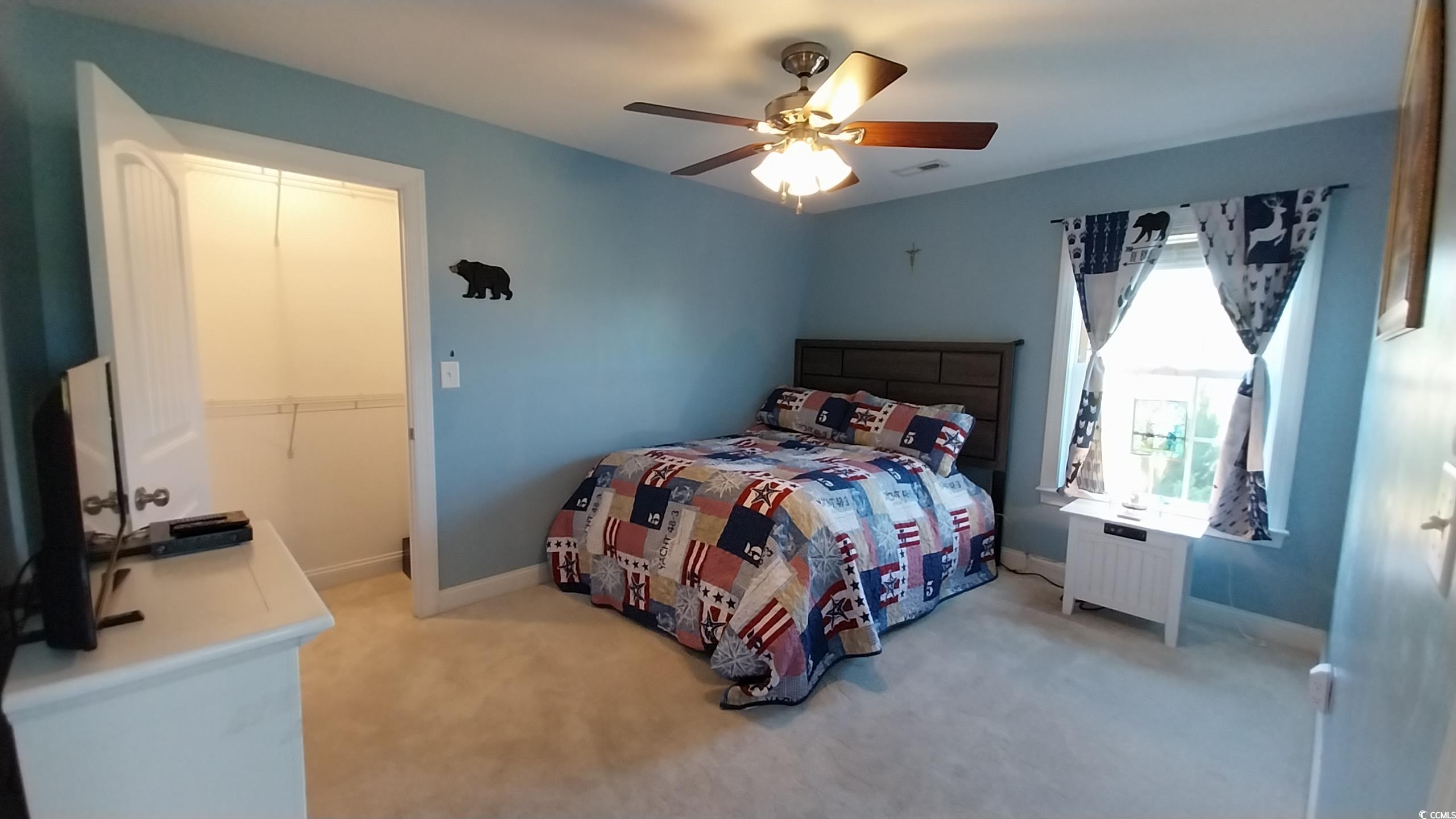 1210 Horry Road Aynor, SC 29511 - Photo 15 of 34 Bedroom with baseboards, a ceiling fan, radiator h