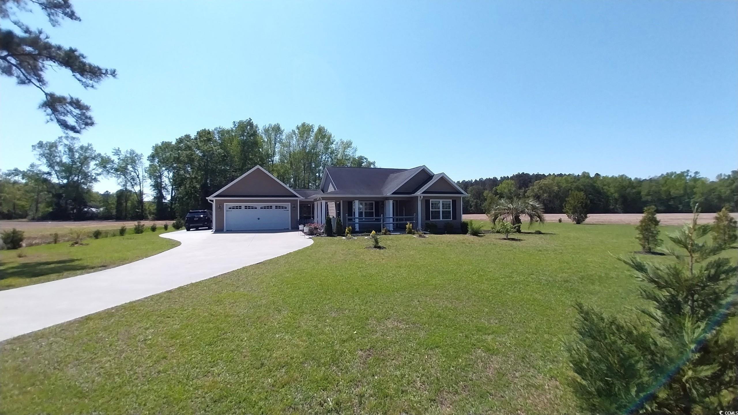1210 Horry Road Aynor, SC 29511 - Photo 26 of 34 View of front facade with an attached garage, driv
