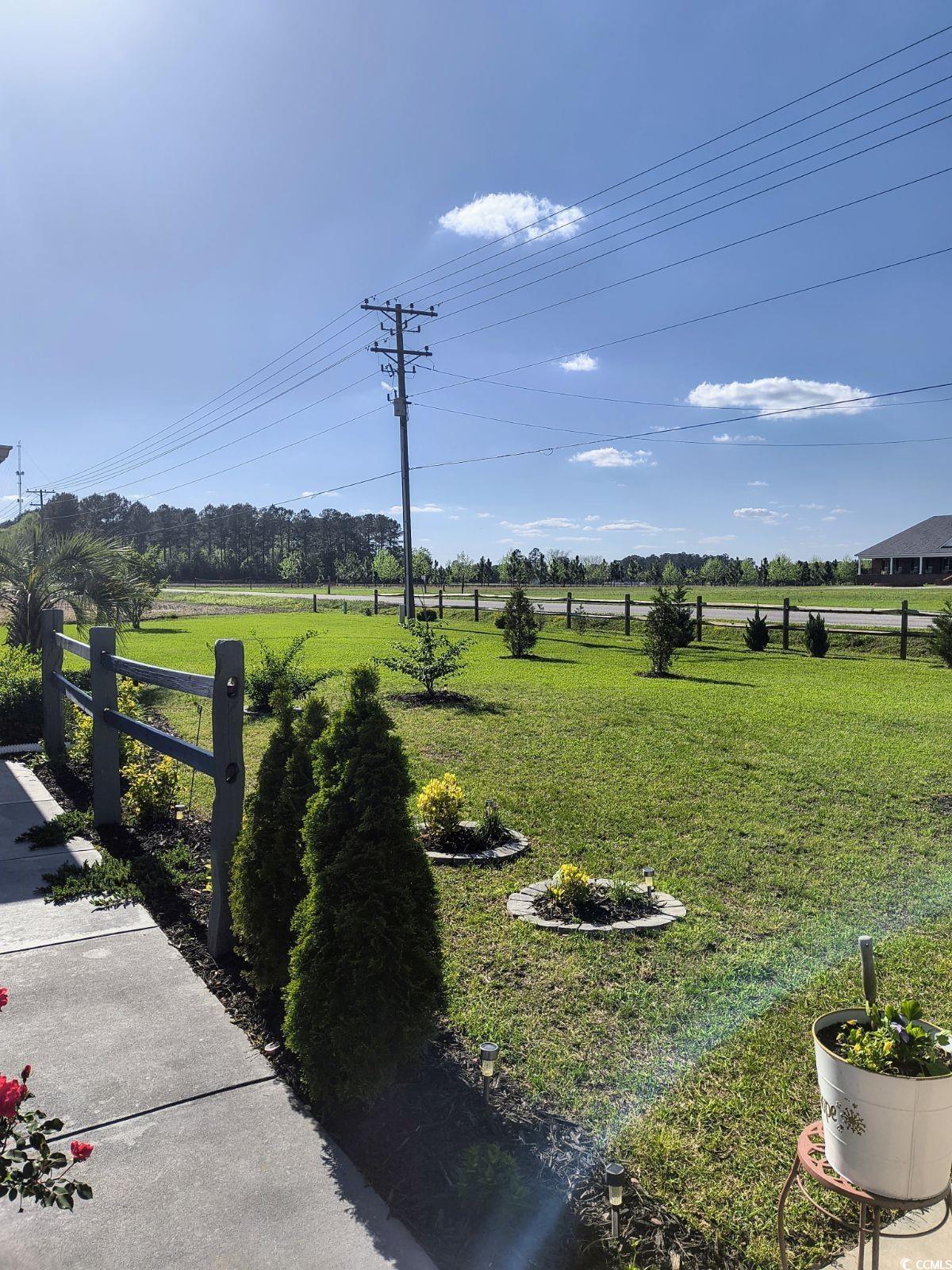 1210 Horry Road Aynor, SC 29511 - Photo 33 of 34 View of yard with a rural view and fence