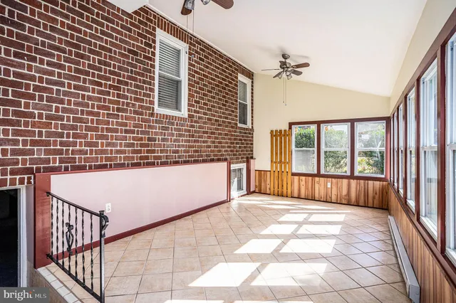 a view of a balcony with a dinning area