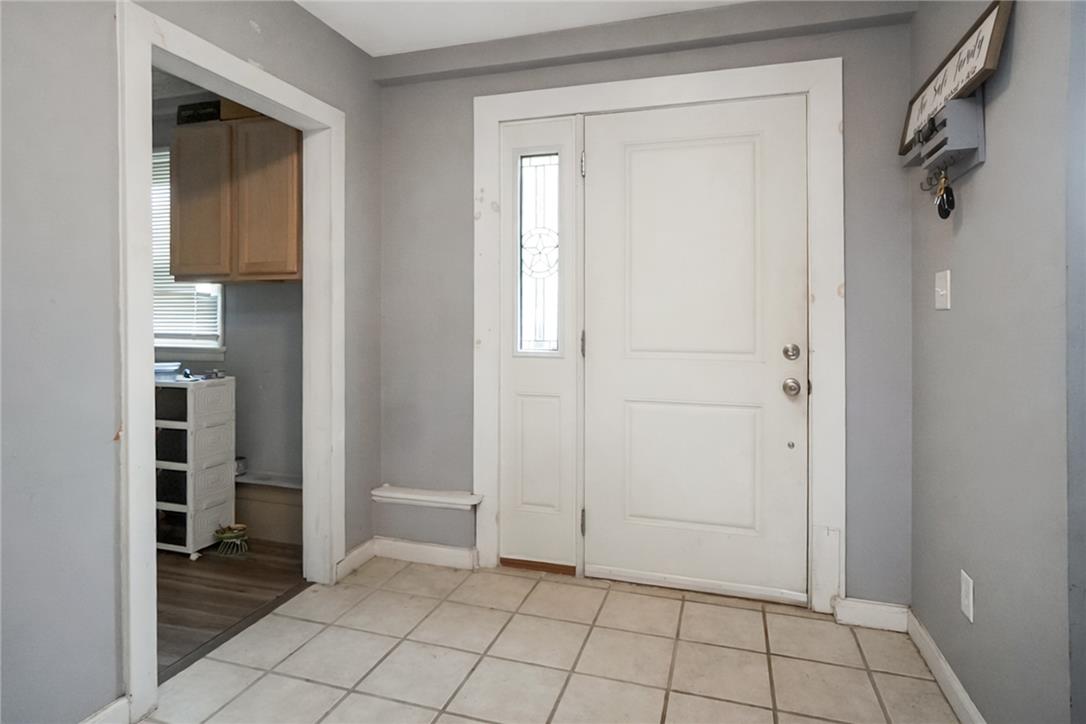3031 Shakespeare Road Bethlehem, PA 18017 - Photo 3 of 30 A well-lit entry features tile flooring and a side window, offering a pleasant welcome.